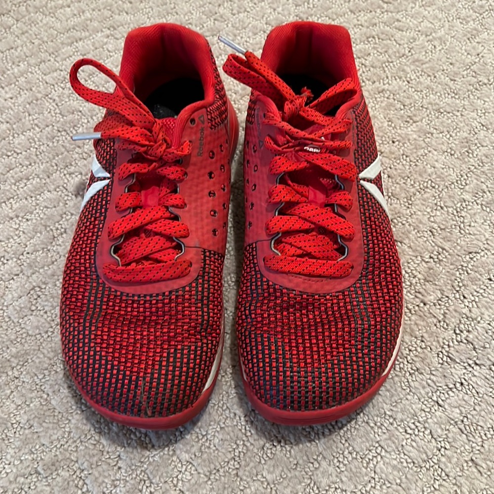 Like new. Reebok CrossFit shoe. Red size 7